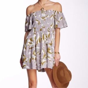 Free People "Louise"
Off-Shoulder Smocked Mini Dress - Size XS